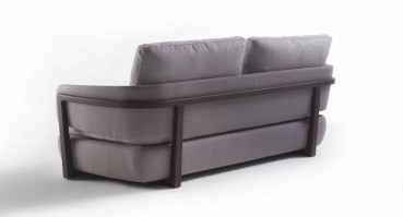 Arena sofa from Porada, showing the exposed wood frame